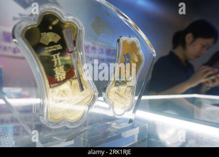HANGZHOU, CHINA - 24. AUGUST 2023 - Goldbarren für die Eröffnungs- und Abschlusszeremonien der 19. Asienspiele werden bei den Hangzhou Asian Games fran gesehen Stockfoto