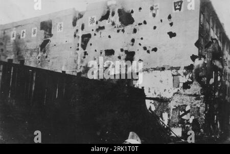 Second Sino-Japanese War, 1937—1945. The battered western wall of the Joint Trust Warehouse (Sihang Warehouse) following the Battle of Shanghai, August 13 - November 26 1937. The Sihang Warehouse served as the last stronghold for the 800 heroes of China's 'Lost Battalion' in their heroic four day stand against attacking Japanese troops during the invasion of Chapei from October 27 - 31, 1937. Stock Photo