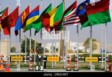 Bildnummer: 53201146  Datum: 15.07.2009  Copyright: imago/Xinhua (090715) -- SHARM EL SHEIKH, July 15, 2009 (Xinhua) -- An Egyptian soldier gurds in front of flags of the members of the Non-Aligned Movement (NAM) in Hotel Maritim Jolie Ville Resort at the Egyptian Red Sea town of Sharm el-Sheik, July 15, 2009. The 15th NAM Summit opened here Wednesday to seek more solidarity among developing countries to tackle major international or regional issues including the ongoing world financial crisis.       (Xinhua/Wang Jianhua)  (zw) (3)EGYPT-15TH NAM-SUMMIT-OPEN  PUBLICATIONxNOTxINxCHN  Gipfel Poli Stock Photo