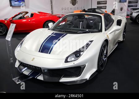 Three-quarters front view of a White, 2020, Ferrari 488 Pista Spyder, on the Premier GT Stand, at the 2023 British Motor Show, Farnborough Stock Photo