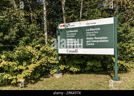 Entry Sign in La Mauricie National Park Quebec, Canada on a beautiful day. Stock Photo