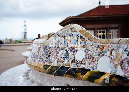 A stunning view of a vivid and vibrant mosaic bench in Guell Park in Barcelona, Spain Stock Photo