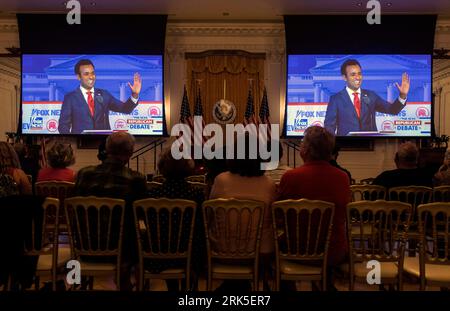 Yorba Linda, California, USA. 23rd Aug, 2023. Guests at the Richard Nixon Presidential Library watch on a large screen as businessman VIVEK RAMASWAMY is introduced during the first 2024 Republican Presidential Debate held in Milwaukee, Wisconsin.(Credit Image: © Brian Cahn/ZUMA Press Wire/Alamy Live News) EDITORIAL USAGE ONLY! Not for Commercial USAGE! Stock Photo