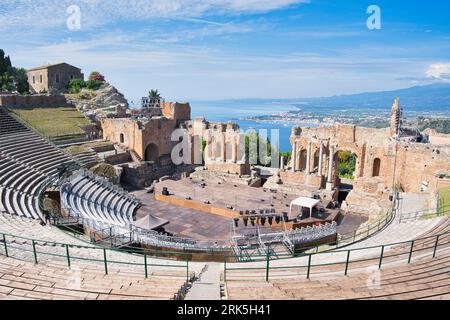 ancient theater in Taormina, Sicily, Italy, entna in the background Stock Photo