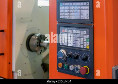 close up view of dashboard of CNC lathe machinery. focus on dashboard. Stock Photo