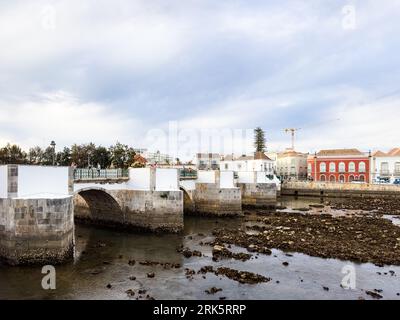 A view of Tavira and the Roman Bridge - Ponte Romana - at sunset in Spring 2023 Stock Photo