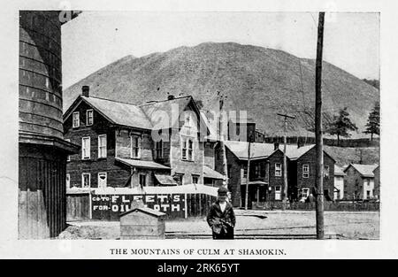 THE MOUNTAINS OF CULM AT SHAMOKIN, Pennsylvania from the Article  October 1896 Coal refuse (also described as coal waste, rock, slag, coal tailings, waste material, rock bank, culm, boney, or gob) is the material left over from coal mining, usually as tailings piles or spoil tips. For every tonne of hard coal generated by mining, 400 kilograms of waste material remains, which includes some lost coal. Piles of coal refuse can have significant negative environmental consequences, including the leaching of iron, manganese, and aluminum residues into waterways and acid mine drainage. The runoff ca Stock Photo