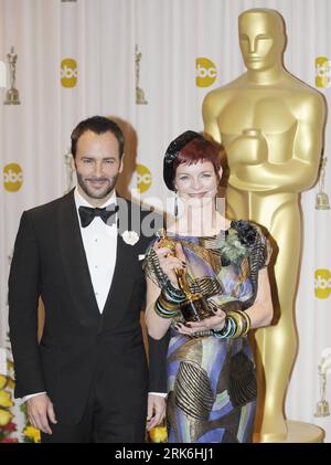 Bildnummer: 53842863  Datum: 07.03.2010  Copyright: imago/Xinhua (100308) -- HOLLYWOOD, March 8, 2010 (Xinhua) -- Sandy Powell holds the trophy after winning the best costume design of the 82nd Academy Awards for The Young Victoria , joined by Tom Ford at the Kodak Theater in Hollywood, California, the United States, March 7, 2010. (Xinhua/Qi Heng) (zw) (32)US-HOLLYWOOD-OSCARS-TROPHY PUBLICATIONxNOTxINxCHN People Film 82. Annual Academy Awards Oscar Oscars Preisträger Trophäe Objekte Highlight kbdig xmk 2010 hoch    Bildnummer 53842863 Date 07 03 2010 Copyright Imago XINHUA  Hollywood March 8 Stock Photo