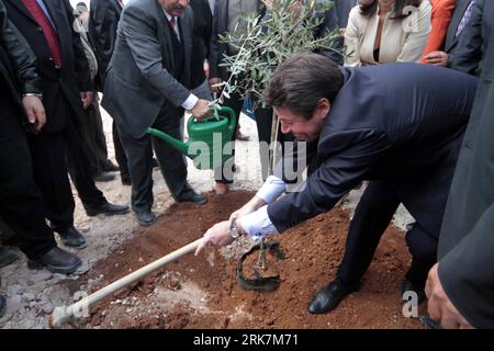 Bildnummer: 53927638  Datum: 08.04.2010  Copyright: imago/Xinhua  French Industry Minister Christian Estrosi plants an olive tree during the inauguration ceremony of the Bethlehem Industrial Park near the West Bank city of Bethlehem on April 8, 2010. France will pay up to 10 million euros to finance the project with the aim of backing the Palestinian economy. (Xinhua/Luay Sababa) BETHLEHEM-FRENCH-INDUSTRY-ESTROSI PUBLICATIONxNOTxINxCHN People Politik premiumd xint kbdig xsp 2010 quer    Bildnummer 53927638 Date 08 04 2010 Copyright Imago XINHUA French Industry Ministers Christian Estrosi Plant Stock Photo