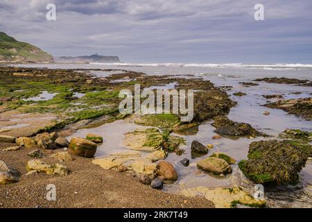 View from the beach in Cornelian Bay looking north towards Scarborough which can just be seen in the distance. Stock Photo