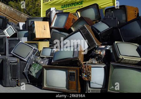 100430 -- BUENOS AIRES, April 30, 2010 Xinhua -- Unused television sets are placed in a pile during a demonstration held by Greenpeace in Buenos Aires, Argentina, April 29, 2010. Greenpeace activists held a demonstration appealing for the government to make laws for electrical and electronic wastes recycling in Buenos Aires. Xinhua/Martin Katzaxy 2ARGENTINA-BUENOS AIRES-GREENPEACE-DEMONSTRATION PUBLICATIONxNOTxINxCHN Stock Photo