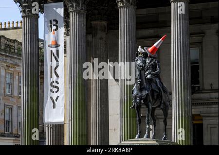 Banksy Cut and Run Ausstellung in der Gallery of Modern Art, Royal Exchange Square und Queen Street, Glasgow, Schottland, Großbritannien, Europa Stockfoto