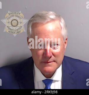 Former White House Chief of Staff Mark Meadows has been booked into the Fulton County Jail. Before his surrender, Meadows was granted a $100,000 bond by the prosecutor’s office and the court. Meadows is charged with violating the state’s RICO act and solicitation of violation of oath by public officer. (Fulton Co. Sheriff's Office Photo) Stock Photo