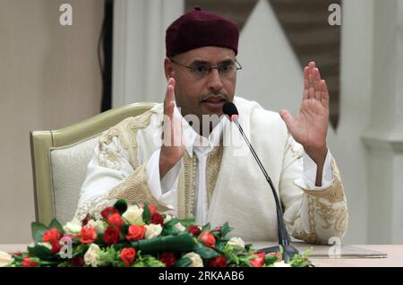 (100812) -- TRIPOLI, AUGUST 12, 2010 (Xinhua) -- Seif al-Islam, son of Libyan leader Moamer Kadhafi and president of the Kadhafi foundation, speaks during a press conference in Tripoli on August 12, 2010 during the signing of agreements with the United Nations Relief and Works Agency for Palestine Refugees (UNRWA). (Xinhua/Hamza Turkia) (1)LIBYA-TRIPOLI-UN-POLITICS PUBLICATIONxNOTxINxCHN   100812 Tripoli August 12 2010 XINHUA Seif Al Islam Sun of Libyan Leader Moamer Kadhafi and President of The Kadhafi Foundation Speaks during a Press Conference in Tripoli ON August 12 2010 during The Signing Stock Photo