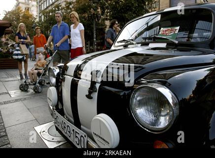 Bildnummer: 54329522  Datum: 22.08.2010  Copyright: imago/Xinhua (100823) -- BELGRADE, Aug. 23, 2010 (Xinhua) -- take look at then Yugoslav cars displayed at Central Square in Belgrade on Aug. 22, 2010. The Zastava 750 car made by the then Yugoslavian car producer Zavod Crvena Zastava was the then Yugoslavian version of Fiat 600 under license from 1955 to 1985. The cars are still widely available in Serbia, Montenegro, and Bosnia and Herzegovina. (Xinhua)(Serbia Out) SERBIA-BELGRADE-OLD CARS-DISPLAY PUBLICATIONxNOTxINxCHN Wirtschaft Gesellschaft Oldtimer Auto Ausstellung kbdig xub 2010 quer  o Stock Photo