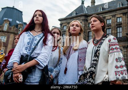 Amsterdam, Netherlands. 24th Aug, 2023. A group of young women seen wearing traditional Ukrainian clothes. This day marks 32 years since Ukraine regained its independence. Because of that, the Ukrainians in the Netherlands Foundation organized a manifestation at the Dam Square in Amsterdam. During the event, they honored the memory of all those who lost their lives in protecting Ukraine and its independence. Credit: SOPA Images Limited/Alamy Live News Stock Photo