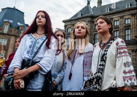 Amsterdam, Netherlands. 24th Aug, 2023. A group of young women seen wearing traditional Ukrainian clothes. This day marks 32 years since Ukraine regained its independence. Because of that, the Ukrainians in the Netherlands Foundation organized a manifestation at the Dam Square in Amsterdam. During the event, they honored the memory of all those who lost their lives in protecting Ukraine and its independence. (Photo by Ana Fernandez/SOPA Images/Sipa USA) Credit: Sipa USA/Alamy Live News Stock Photo