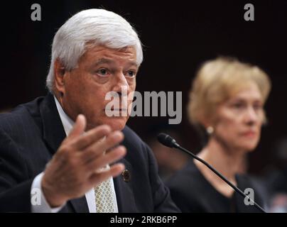 (100930) -- WASHINGTON D.C., Sept. 30, 2010 (Xinhua) -- Chairman and CEO of Johnson and Johnson William Weldon (L), and worldwide Chairman of Johnson and Johnson s Consumer Group Colleen Goggins, testify during a hearing on Johnson and Johnson s recall of children s tylenol and other children s medicine and the phantom recall of motrin, before the House Oversight and Government Reform Committee on Capitol Hill in Washington D.C., capital of the United States, Sept. 30, 2010. The hearing examined the quality issues at McNeil Consumer Healthcare, one of the Johnson and Johnson companies. (Xinhua Stock Photo