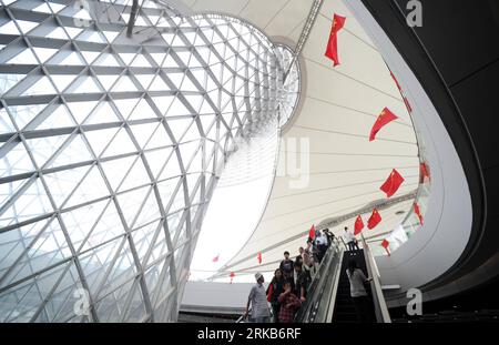 Bildnummer: 54499926  Datum: 01.10.2010  Copyright: imago/Xinhua (101001) -- SHANGHAI, Oct. 1, 2010 (Xinhua) -- The Chinese national flags fly over the Sun Valley at the World Expo Park in Shanghai, east China, Oct. 1, 2010. A series of activities are to be held in the World Expo Park to mark China National Pavilion Day on Friday, during the 61st anniversary of the founding of the People s Republic of China. (Xinhua/Wang Jianhua) (zgp) EXPO-SHANGHAI-NATIONAL PAVILION DAY-CHINA (CN) PUBLICATIONxNOTxINxCHN Gesellschaft China Nationalfeiertag kbdig xsp 2010 quer   o0  61 Jahrestag Gründung Fahne Stock Photo