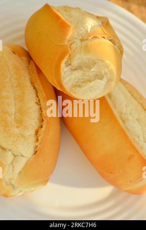 Close-up of warm and tasty French bread, ready to conquer your taste buds. Stock Photo