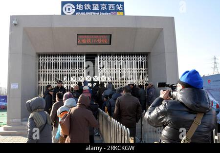 Bildnummer: 54777303  Datum: 30.12.2010  Copyright: imago/Xinhua (101230) -- BEIJING, Dec. 30, 2010 (Xinhua) -- Passengers enter the Wangjing West Station of No. 15 Line in Beijing, capital of China, Dec. 30, 2010. Beijing opened five new suburban subway and light rail lines Thursday as it moves to tackle the city s chronic traffic congestion problem though the development of its rapid transit network. The five new lines -- Fangshan Line, Changping Line, the first phase of the No. 15 Line, Yizhuang Line and Daxing Line -- have a combined length of 108 kilometers, bringing the total length of m Stock Photo