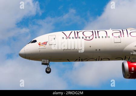 Virgin Atlantic Boeing 787-9 Dreamliner jet airliner plane on finals to land, London Heathrow Airport, UK. Named West End Girl. Scarlet lady nose art Stock Photo