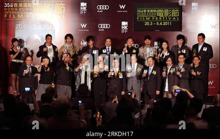 Bildnummer: 54948402  Datum: 24.02.2011  Copyright: imago/Xinhua (110224) -- HONG KONG, Feb. 24, 2011 (Xinhua) -- Representatives of the Hong Kong International Film Festival Society and other guests cheer during the announcing ceremony of the 35th Hong Kong International Film Festival (HKIFF) in Hong Kong, south China, Feb. 24, 2011. The 35th HKIFF will take place between Mar. 20 and Apr. 5, 2011 and will open with the films Don t Go Breaking My Heart and Quattro Hong Kong 2 .(Xinhua/Chen Xiaowei) (xzj) CHINA-HONG KONG-35TH HKIFF-ANNOUNCING CEREMONY (CN) PUBLICATIONxNOTxINxCHN Entertainment P Stock Photo