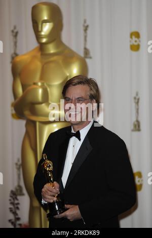 Bildnummer: 54961519  Datum: 27.02.2011  Copyright: imago/Xinhua (110228) -- HOLLYWOOD, Feb. 28, 2011 (Xinhua) -- Aaron Sorkin poses with the trophy after winning the best Adapted Screenplay of the 83rd Annual Academy Awards for the film The Social Network at the Kodak Theater in Hollywood, California, the United States, Feb. 27, 2011. (Xinhua/Qi Heng) (cl) U.S.-HOLLYWOOD-OSCARS-WINNERS PUBLICATIONxNOTxINxCHN Entertainment People Film Oscar Verleihung Oscarverleihung Los Angeles Preisträger kbdig xkg 2011 hoch o0 Bestes Drehbuch    Bildnummer 54961519 Date 27 02 2011 Copyright Imago XINHUA  Ho Stock Photo