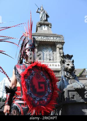 Bildnummer: 54965678  Datum: 28.02.2011  Copyright: imago/Xinhua (110301)-- MEXICO CITY, March 1, 2011 (Xinhua)-- An Indigenous man dressed with traditional clothing participates in the commemoration of the 486 anniversary of the death of Aztec leader Cuauhtemoc at the monument erected in his honor in Mexico City, capital of Mexico, on Feb. 28, 2011. (Xinhua/Juan Francisco Palencia) (jl) MEXICO-MEXICO CITY-AZTEC-MEMORIAL PUBLICATIONxNOTxINxCHN Gesellschaft Kultur Jahrestag Todestag Azteken Aztekenführer Führer premiumd kbdig xsk 2011 hoch Highlight premiumd  o0 Herrscher, Aztekenherrscher, Ged Stock Photo