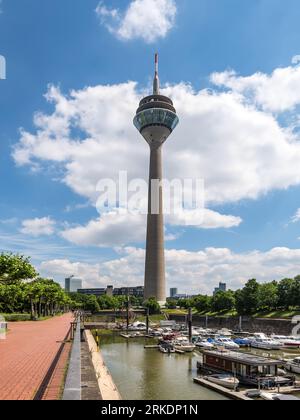 Dusseldorf, Germany - June 2, 2022: Street view of Dusseldorf at day with Media Harbour and Rheinturm tower in North Rhine-Westphalia, Germany. Stock Photo