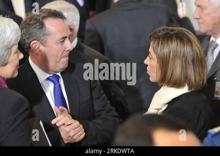 Bildnummer: 55012698  Datum: 10.03.2011  Copyright: imago/Xinhua BRUSSELS, March 10, 2011 (Xinhua) -- British Defence Secretary Liam Fox (L) talks with Spanish Defense Minister Carme Chacon during the family photo session of NATO Defense Ministers meeting on Libya at the NATO headquarters in Brussels, capital of Belgium, on March 10, 2011. NATO s defense ministers gathered Thursday to discuss the situation in Libya. (Xinhua/Wu Wei) (wjd) BELGIUM-NATO-DEFENSE MINISTERS-LIBYA PUBLICATIONxNOTxINxCHN People Politik kbdig xkg 2011 quer    Bildnummer 55012698 Date 10 03 2011 Copyright Imago XINHUA B Stock Photo