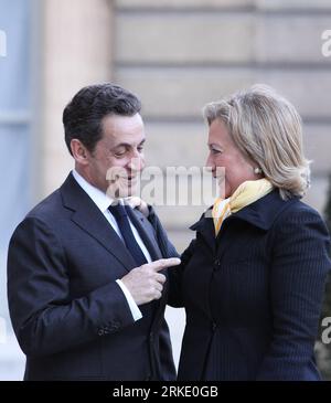 (110314) -- PARIS, March 14, 2011 (Xinhua) -- French President Nicolas Sarkozy (L) welcomes US Secretary of State Hillary Clinton prior to the Foreign Ministers of the Group of Eight (G8) meeting, at the Elysee Palace in Paris, capital of France, March 14, 2011. (Xinhua/Gao Jing) (wjd) FRANCE-US-SARKOZY-CLINTON-G8 MEETING PUBLICATIONxNOTxINxCHN Stock Photo