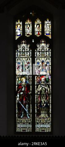 Stained glass window depicting Courage and Humility by AL Moore 1913, church of Saint George, Stowlangtoft, Suffolk, England, UK Stock Photo