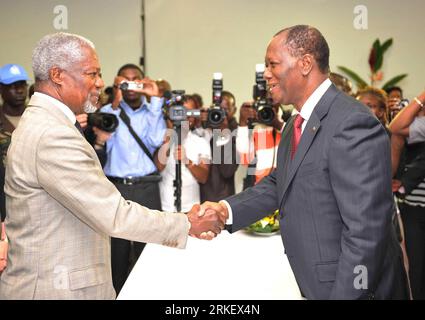 (110501) -- ABIDJAN, May 1, 2011 (Xinhua)-- Cote d Ivoire s president-elect Alassane Ouattara (R) shakes hands with former UN Secretary General Kofi Annan in the Golf Hotel, Abidjan, Cote d Ivoire, on May 1, 2011. Former UN Secretary General Kofi Annan, former South African Archbishop Desmond Tutu and former high commissioner for the UN Human Rights Affairs Mary Robinson arrived in Abidjan on Sunday for a two-day visit to encourage healing and national reconciliation with the people in different sectors in Cote d Ivoire. (Xinhua/Ding Haitao) COTE D IVOIRE-ABIDJAN-INTERNATIONAL MEDIATORS PUBLIC Stock Photo