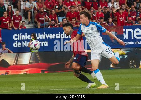Pamplona, Spain. 24th Aug, 2023. Sports. Football/Soccer.Ruben Garcia (14. CA Osasuna) and Maxim De Cuyper (55. Club Brugge ) during the football match of First leg of the UEFA Europa Conference League qualifier play-off between CA Osasuna and Club Brugge played at El Sadar stadium in Pamplona (Spain) on August 24, 2023. Credit: Inigo Alzugaray/CordonPress Credit: CORDON PRESS/Alamy Live News Stockfoto