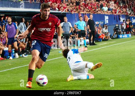 Pamplona, Spain. 24th Aug, 2023. Sports. Football/Soccer.Jesus Areso (12. CA Osasuna) and Maxim De Cuyper (55. Club Brugge ) during the football match of First leg of the UEFA Europa Conference League qualifier play-off between CA Osasuna and Club Brugge played at El Sadar stadium in Pamplona (Spain) on August 24, 2023. Credit: Inigo Alzugaray/CordonPress Credit: CORDON PRESS/Alamy Live News Stockfoto