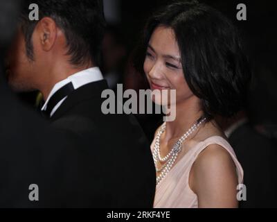 Bildnummer: 55345947  Datum: 13.05.2011  Copyright: imago/Xinhua (110514) -- CANNES, (Xinhua) -- Chinese actress Tang Wei (R) attends the midnight screening of Wuxia presented out of competition at the 64th Cannes Film Festival in Cannes, France, . (Xinhua/Gao Jing) (zx) FRANCE-CANNES FILM FESTIVAL-WUXIA PUBLICATIONxNOTxINxCHN Kultur Entertainment People Film 64. Internationale Filmfestspiele Cannes Filmpremiere kbdig xkg 2011 quer    Bildnummer 55345947 Date 13 05 2011 Copyright Imago XINHUA  Cannes XINHUA Chinese actress Tang Wei r Attends The Midnight Screening of Wuxia presented out of Com Stock Photo