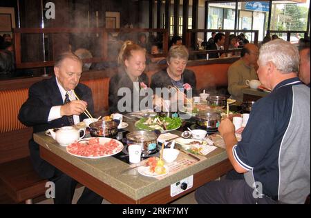 Bildnummer: 55360064  Datum: 02.05.2011  Copyright: imago/Xinhua (110518) -- BAOTOU, May 18, 2011 (Xinhua) -- File photo shows customers enjoy the meal at a restaurant of Little Sheep Group in Toronto, Canada. Little Sheep is a Chinese chain restaurant specialized in hot-pot with 300 units in China. Yum! Brands proposed bid for Chinese hot pot restaurant chain Little Sheep Group will be subject to China s anti-monopoly inspection process. Already owns 27 percent of the Little Sheep, Yum! Brands is hoping to share 93.2 percent stake in the Little Sheep after the chain restaurant goes to privati Stock Photo