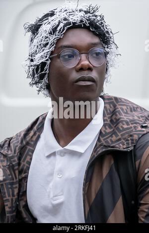 London, UK. 24th August 2023. TikTok prankster known as Mizzy arrives to Stratford Magistrates Court accused of breaking his criminal behaviour order. Mizzy, real name Bacari Bronze O’Garro, is accused of filming members of the public at Westfield Centre in Stratford in breach of a criminal behaviour order banning him from filming people without their consent. He was was previously found guilty of entering a train driver's cab and interfering with the controls, putting the safety of members of the public at risk. Credit: Guy Corbishley/Alamy Live News Stock Photo