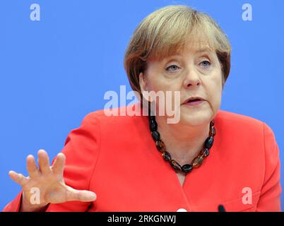 Bildnummer: 55610614  Datum: 22.07.2011  Copyright: imago/Xinhua (110722) -- BERLIN, July 22, 2011 (Xinhua) -- German Chancellor Angela Merkel speaks at a press conference in Berlin, Germany, July 22, 2011. Merkel on Friday expressed confidence in Greece s getting over the debt crisis, saying that her country and other eurozone members has historic duty to defend the euro. (Xinhua/Ma Ning) (zw) GERMANY-BERLIN-MERKEL-PRESS CONFERENCE PUBLICATIONxNOTxINxCHN People Politik xda x0x premiumd Porträt 2011 quer     Bildnummer 55610614 Date 22 07 2011 Copyright Imago XINHUA 110 722 Berlin July 22 2011 Stock Photo
