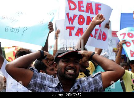 Bildnummer: 55629826  Datum: 29.07.2011  Copyright: imago/Xinhua (110729) -- COLOMBO, July 29, 2011 (Xinhua) -- Dozens of Sri Lankans with hearing impairment take part in a protest march demanding the government set aside three percent of employment to disabled people, in Colombo, Sri Lanka, July 29, 2011. It is estimated that there are more than 70,000 disabled who are short of hearing in the country. (Xinhua/K.Dinara)(axy) SRI LANKA-COLOMBO-DISABLED-PROTEST PUBLICATIONxNOTxINxCHN Gesellschaft Protest Demo Politik Gehörlose x0x xst 2011 quer     Bildnummer 55629826 Date 29 07 2011 Copyright I Stock Photo