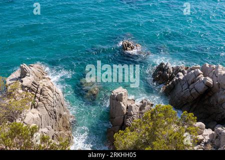 Aerial View of Turquoise Lagoon with Submerged Rocks, Spain Stock Photo