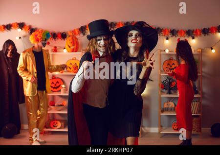Portrait of dressed people have fun at Halloween party Stock Photo