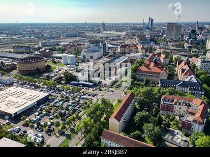 Leipzig, Germany. 23rd Aug, 2023. View of the district 'Zentrum Nord' with the Stadtwerke Leipzig (l) and the city center in the background. (Aerial view with drone) Credit: Jan Woitas/dpa/Alamy Live News Stock Photo