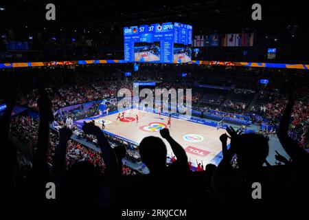 Okinawa, Japan. 25th Aug, 2023. Spectators cheer while watching the group E first round match between Germany and Japan at the FIBA World Cup 2023 in Okinawa, Japan, Aug. 25, 2023. Credit: Zhang Xiaoyu/Xinhua/Alamy Live News Stock Photo