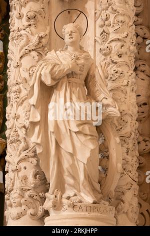 MONOPOLI, ITALY - MARCH 5, 2022: The statue of St. Catharina of Alexandria in the church Chiesa di san Domenico. Stock Photo