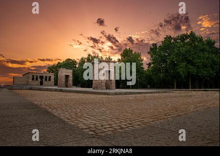 A breathtaking view of the ancient Temple of Debod in Madrid, Spain during a sunset. Stock Photo