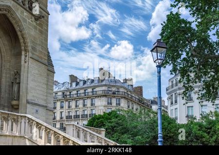 Paris, buildings in the Marais, in the center, in a typical street, with the Saint-Jacques tower Stock Photo