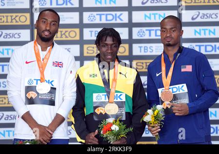 Great Britain's Matthew Hudson-Smith (silver), Jamaica’s Antonio Watson (gold) and USA’s Quincy Hall (bronze) during the medal ceremony for the Men's 400 Metres on day seven of the World Athletics Championships at the National Athletics Centre in Budapest, Hungary. Picture date: Friday August 25, 2023. Stock Photo