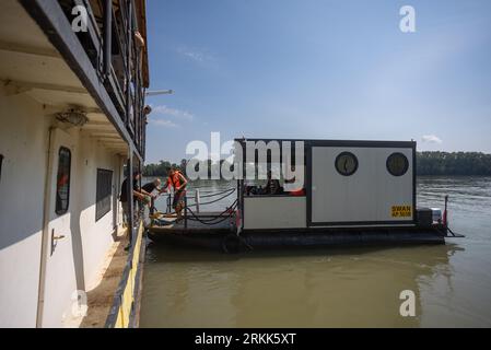 Batina, Croatia. 24th Aug, 2023. Ship Swan is a connection between Batin and Liberland, near Batina, Croatia, on August 24, 2023. Liberland, also known as the Free Republic of Liberland, is an unrecognised micronation in Southeast Europe claiming an uninhabited parcel of disputed land on the western bank of the Danube, between Croatia and Serbia. It was proclaimed on 13 April 2015 by a eurosceptic politician from the Czech Republic Vit Jedlicka. Photo: Davor Javorovic/PIXSELL Credit: Pixsell/Alamy Live News Stockfoto